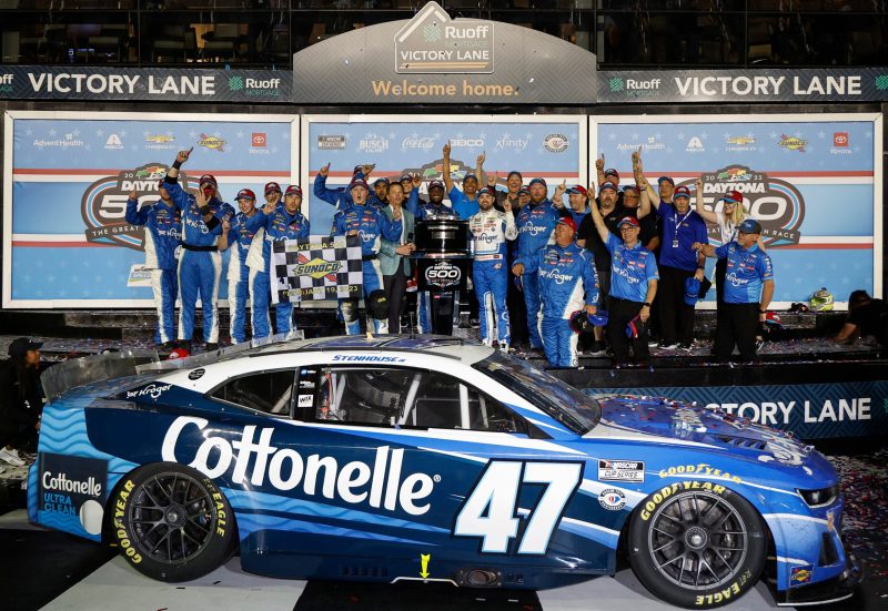 Ricky Stenhouse Jr., driver of the #47 Kroger/Cottonelle Chevrolet, and crew celebrate in victory lane after winning the NASCAR Cup Series 65th Annual Daytona 500 at Daytona International Speedway on February 19, 2023 in Daytona Beach, Florida. (Photo by Chris Graythen/Getty Images)