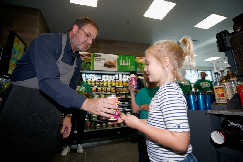 FORT WORTH, TX - NOVEMBER 02:  "Grand opening" festivities of 7-Eleven on property. General ambiance shots of fans on site, Kyle Busch autograph session, fans getting items signed, fans in M&Ms simulator or checking out show car, TMS President Eddie Gossage serving free Slurpees to fans during practice for the Monster Energy NASCAR Cup Series AAA Texas 500 at Texas Motor Speedway on November 2, 2018 in Fort Worth, Texas.  (Photo by Matt Sullivan/Getty Images)