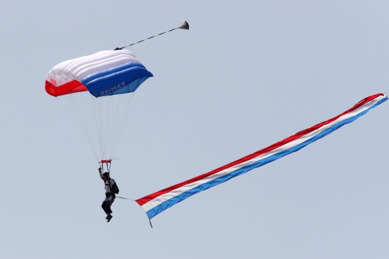 Mar 26, 2023; Austin, Texas, USA;  A member of the ReMax skydiving team before the NASCAR Cup Series EchoPark Automotive Grand Prix at the Circuit of the Americas. Credit: Michael C. Johnson
