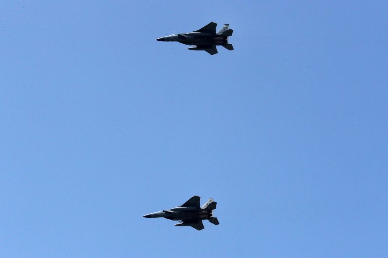 Mar 26, 2023; Austin, Texas, USA;  Two F-15 fighter jets from the 159th Fighter Wing, Louisiana Air National Guard perform a flyby before the NASCAR Cup Series EchoPark Automotive Grand Prix at the Circuit of the Americas. Credit: Michael C. Johnson