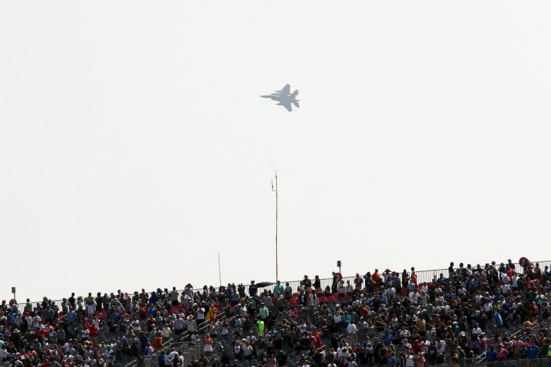 Mar 26, 2023; Austin, Texas, USA;  An F15 Fighter Jet from the 159th Fighter Wing, Louisiana Air National Guard flies over the 1st corner  before the NASCAR Cup Series EchoPark Automotive Grand Prix at the Circuit of the Americas. Credit: Michael C. Johnson