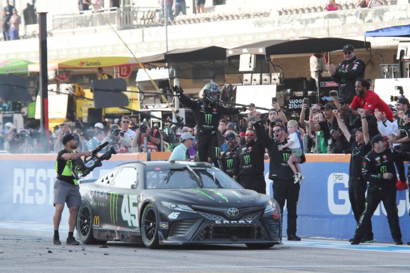 Mar 26, 2023; Austin, Texas, USA;  NASCAR Cup Series driver Tyler Reddick (45) reacts after winning the EchoPark Automotive Grand Prix at the Circuit of the Americas. Credit: Michael C. Johnson