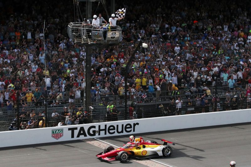 May 28, 2023; Speedway, IN, USA;  Joseph Newgarden, Team Penske (2) exits his car at the yard of bricks after winning the 107th Indianapolis 500 by Gainbridge at the Indianapolis Motor Speedway; Credit: Michael C. Johnson