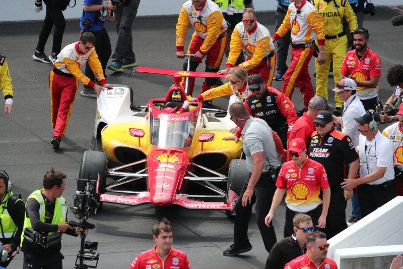 May 28, 2023; Speedway, IN, USA;  Joseph Newgarden, Team Penske (2) crew pushes the car into victory lane after winning the 107th Indianapolis 500 by Gainbridge at the Indianapolis Motor Speedway; Credit: Michael C. Johnson