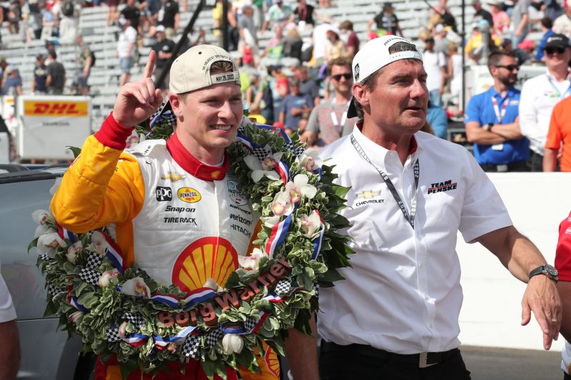 May 28, 2023; Speedway, IN, USA;  Joseph Newgarden, Team Penske (2) celebrates after winning the 107th Indianapolis 500 by Gainbridge with Penske Team President Tim Cindric at the Indianapolis Motor Speedway; Credit: Michael C. Johnson