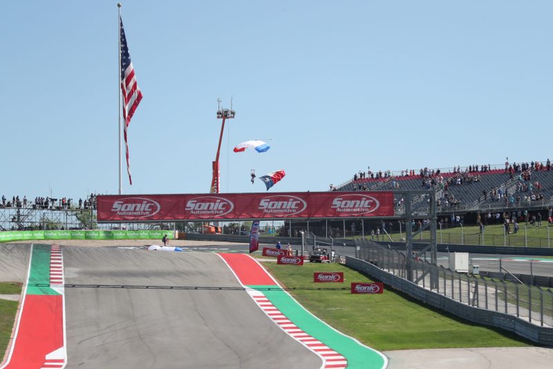 Mar 25, 2023; Austin, Texas, USA;  The Texas flag arrives before the NASCAR Xfinity Series Pit Boss 250 presented by USA Today at the Circuit of the Americas. Credit: Michael C. Johnson