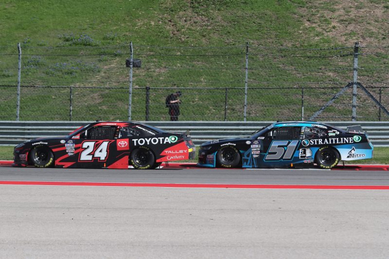 Mar 25, 2023; Austin, Texas, USA;  NASCAR Xfinity Series drivers Connor Mosaic (24) and Jeremy Clements (51) compete in the Pit Boss 250 presented by USA Today at the Circuit of the Americas. Credit: Michael C. Johnson