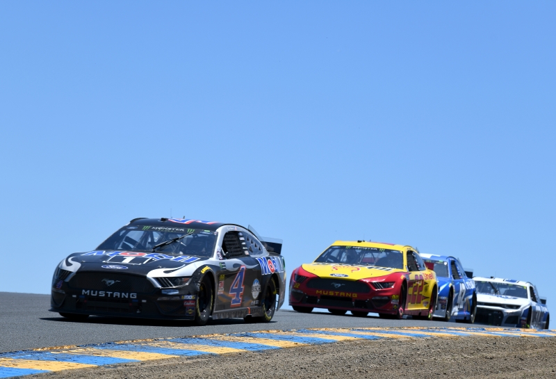 SONOMA, CALIFORNIA - JUNE 23: Kevin Harvick, driver of the #4 Mobil 1 Ford, leads a pack during the Monster Energy NASCAR Cup Series Toyota/Save Mart 350 at Sonoma Raceway on June 23, 2019 in Sonoma, California. (Photo by Robert Reiners/Getty Images)