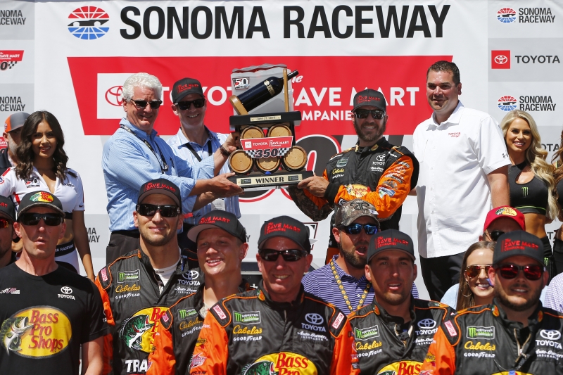 Martin Truex Jr., driver of the #19 Bass Pro Shops Toyota, celebrates in Victory Lane after winning the Monster Energy NASCAR Cup Series Toyota/Save Mart 350 at Sonoma Raceway on June 23, 2019 in Sonoma, California. (Photo by Jonathan Ferrey/Getty Images)