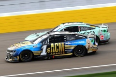 Ross Chastain, driver of the #1 ACM Awards Chevrolet, and Kyle Busch, driver of the #18 Ethel M Chocolates Toyota, race during the NASCAR Cup Series Pennzoil 400 at Las Vegas Motor Speedway on March 06, 2022 in Las Vegas, Nevada. (Photo by Meg Oliphant/Getty Images)