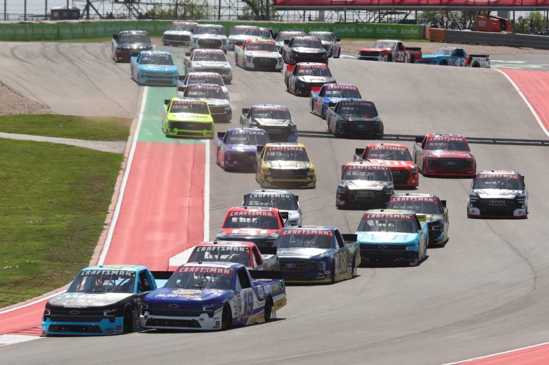Mar 25, 2023; Austin, Texas, USA;  NASCAR Craftsman Truck Series drivers Christian Eckes (19) and Ross Chastain (41) lead the field in the XPEL 225 at the Circuit of the Americas. Credit: Michael C. Johnson