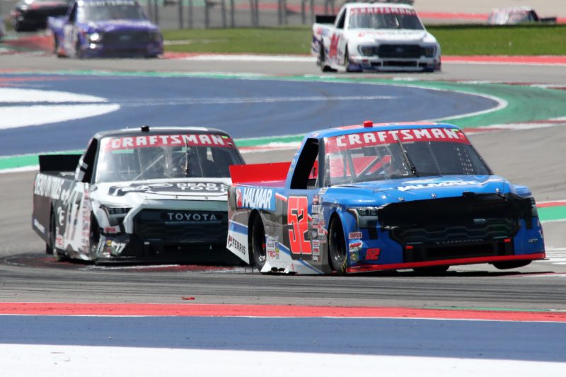 Mar 25, 2023; Austin, Texas, USA;  NASCAR Craftsman Truck Series driver Stewart Friesen (52) leads Taylor Gray (17) in the XPEL 225 at the Circuit of the Americas. Credit: Michael C. Johnson