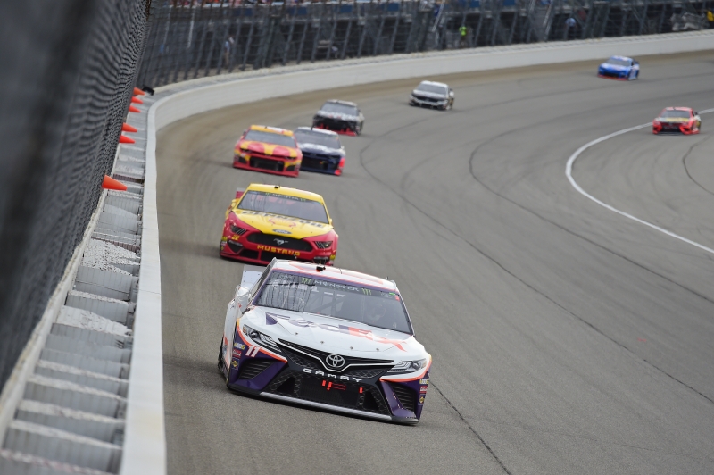 JOLIET, ILLINOIS - JUNE 30: Denny Hamlin, driver of the #11 FedEx Express Toyota, leads a pack of cars during the Monster Energy NASCAR Cup Series Camping World 400 at Chicagoland Speedway on June 30, 2019 in Joliet, Illinois. (Photo by Jared C. Tilton/Getty Images)