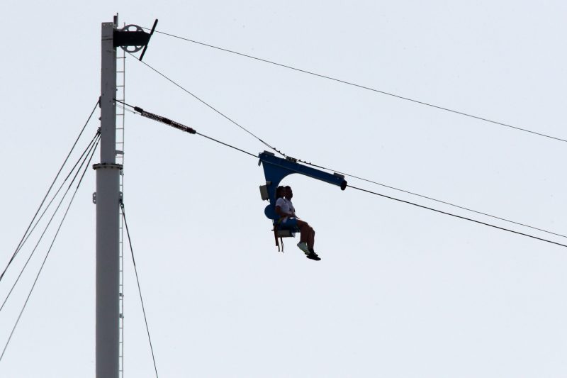 Mar 26, 2023; Austin, Texas, USA;  Fans on the zip line during the NASCAR Cup Series EchoPark Automotive Grand Prix at the Circuit of the Americas. Credit: Michael C. Johnson