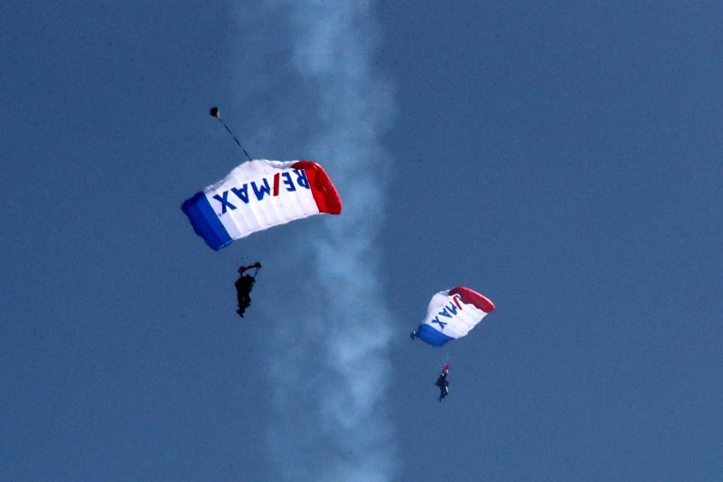 Mar 26, 2023; Austin, Texas, USA;  the ReMax sky diving team before the NASCAR Cup Series EchoPark Automotive Grand Prix at the Circuit of the Americas. Credit: Michael C. Johnson
