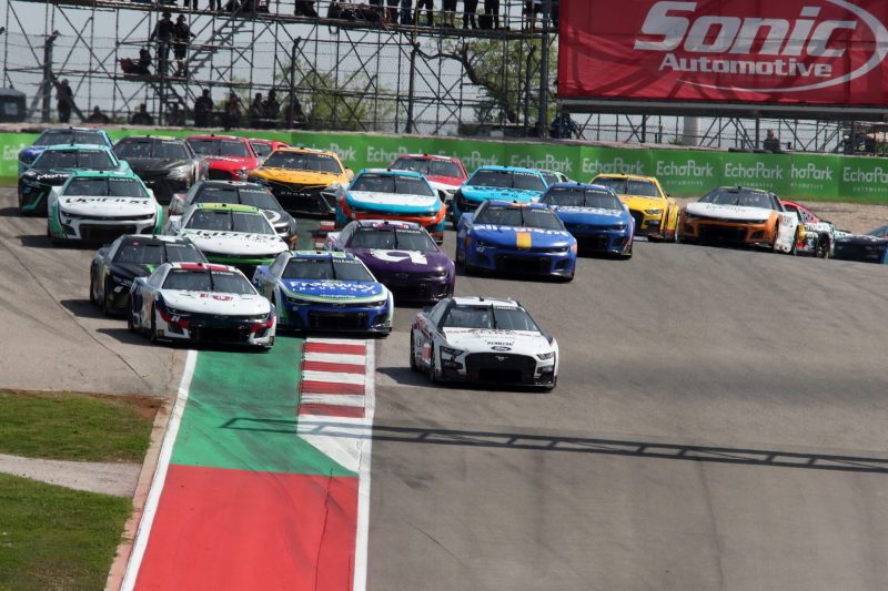 Mar 26, 2023; Austin, Texas, USA;  NASCAR Cup Series driver Austin Cindric (2) leads the field during the EchoPark Automotive Grand Prix at the Circuit of the Americas. Credit: Michael C. Johnson