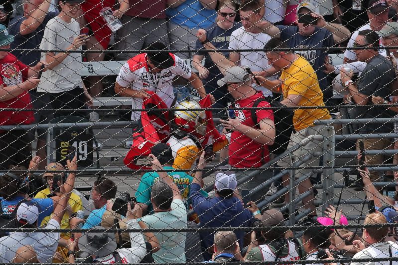 May 28, 2023; Speedway, IN, USA;  Joseph Newgarden, Team Penske (2) celebrates after winning the 107th Indianapolis 500 by Gainbridge by going into the grandstands at the Indianapolis Motor Speedway; Credit: Michael C. Johnson