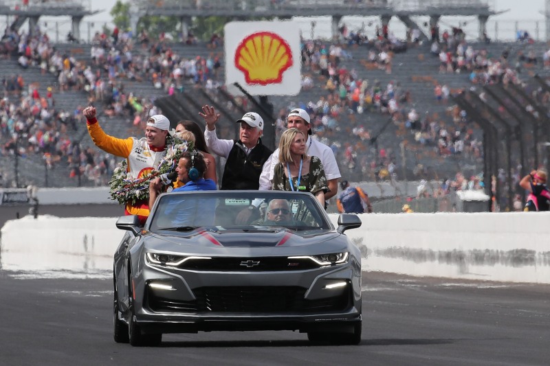 May 28, 2023; Speedway, IN, USA;  Joseph Newgarden, Team Penske (2) celebrates after winning the 107th Indianapolis 500 by Gainbridge with team and track owner Roger Penske at the Indianapolis Motor Speedway; Credit: Michael C. Johnson
