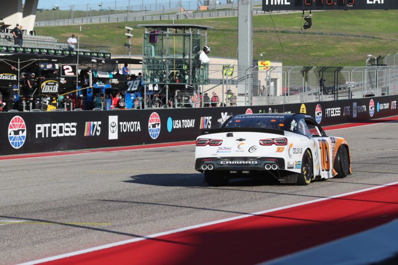 Mar 25, 2023; Austin, Texas, USA;  NASCAR Xfinity Series driver AJ Allmendinger (10) takes the white flag during the Pit Boss 250 presented by USA Today at the Circuit of the Americas. Credit: Michael C. Johnson