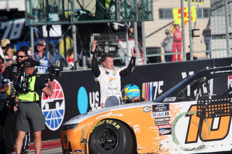 Mar 25, 2023; Austin, Texas, USA;  NASCAR Xfinity Series driver AJ Allmendinger (10) reacts after winning the Pit Boss 250 presented by USA Today at the Circuit of the Americas. Credit: Michael C. Johnson